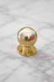 Złota gałka meblowa hampton